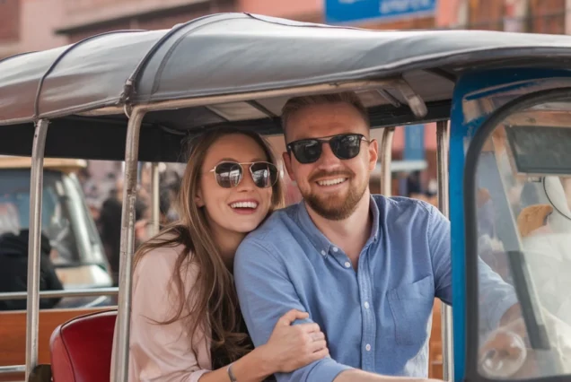 Travelers enjoying a TukTuk ride in Marrakech